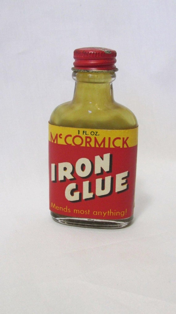 Items similar to McCormick Iron Glue Bottle Vintage Glass Jar with old