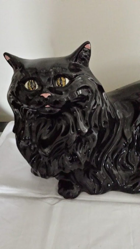 black and white ceramic cat figurine