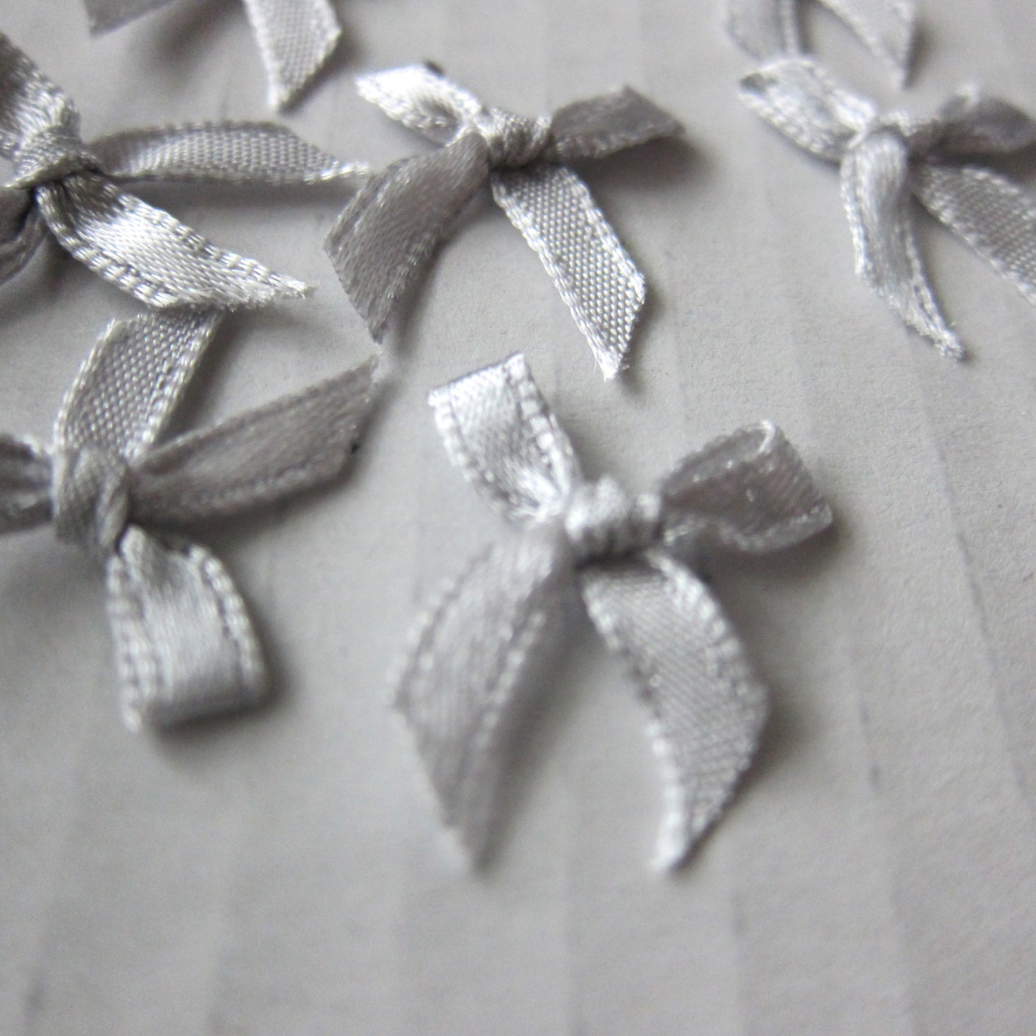 100 bows satin mini bows in silver by amadeuscouturesupply 100 bows satin mini bows in silver by amadeuscouturesupply