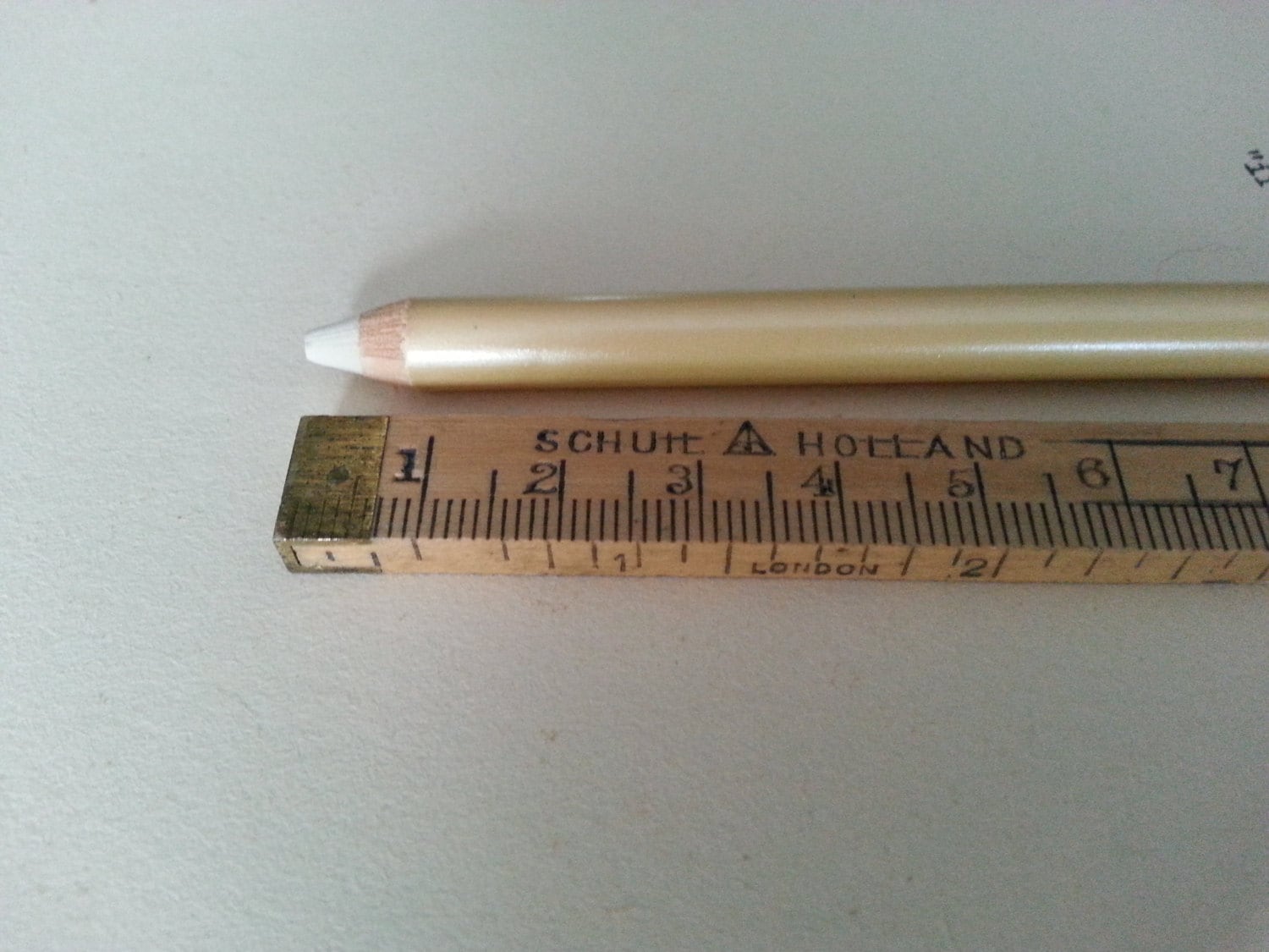 Typewriter eraser pencil shape with brush