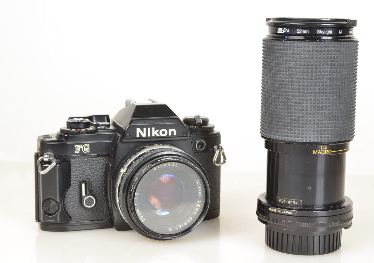 Nikon FG 35mm Film Camera with Two Lenses & New Batteries In