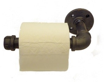 Pipe toilet paper holder