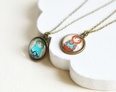 Russian Motifs // Round pendant metal brass depicting dolls under glass // Barbie from Russia with love // Red, blue, colorful // Fashion Russian Motifs // Round pendant metal brass depicting dolls under glass // Barbie from Russia with love // Red, blue, colorful // Fashion