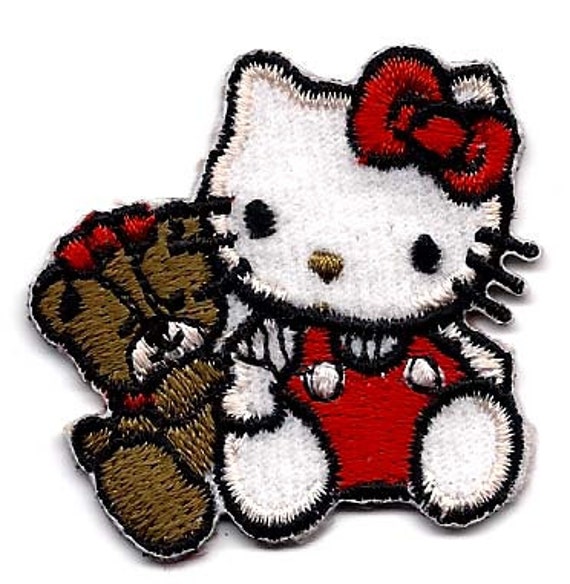 hello kitty with teddy bear