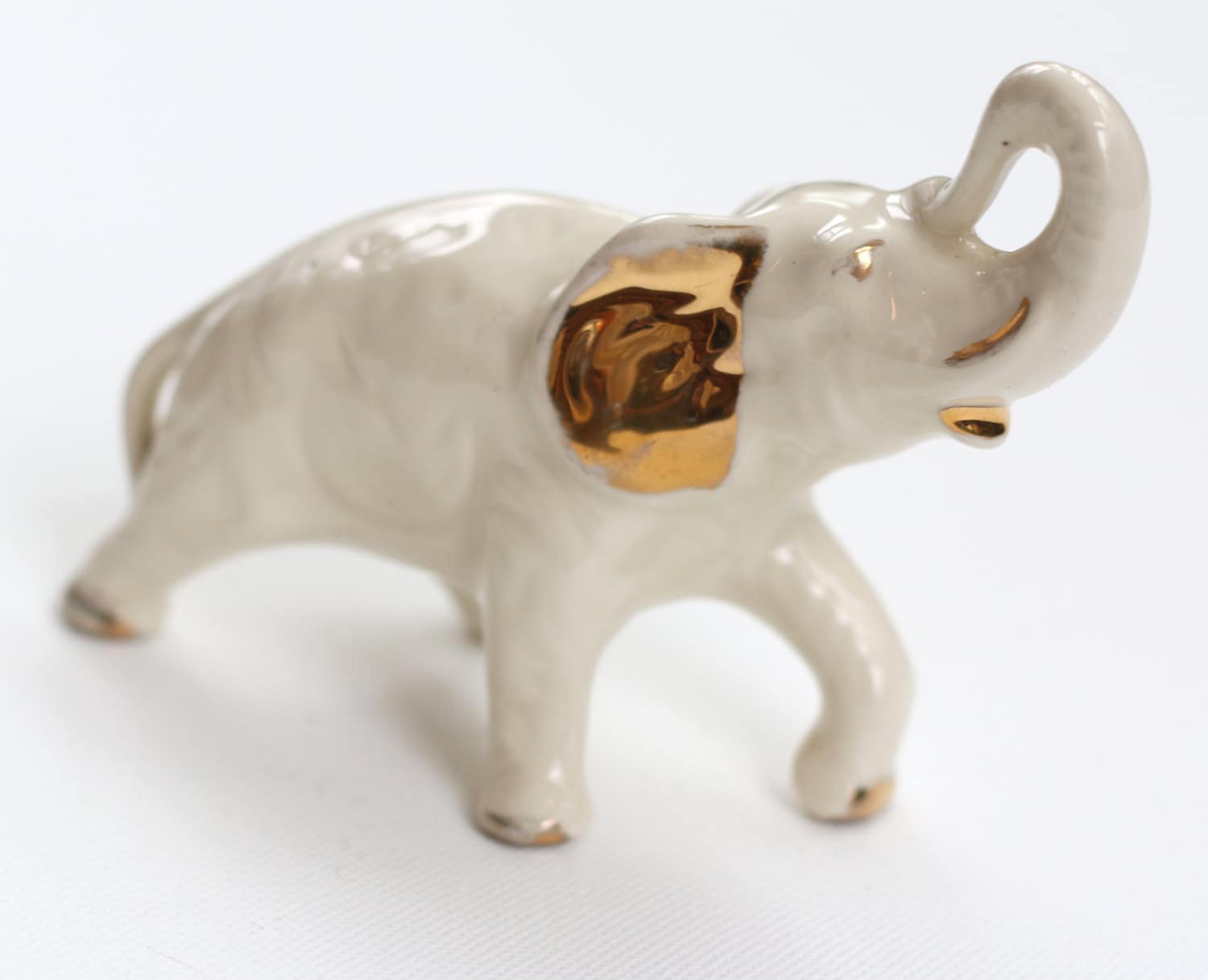 Antique White Elephant Figurine with Gold Accents