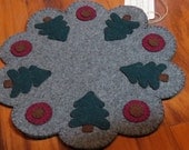 Hand stitched, felted wool, penny rug candle mat