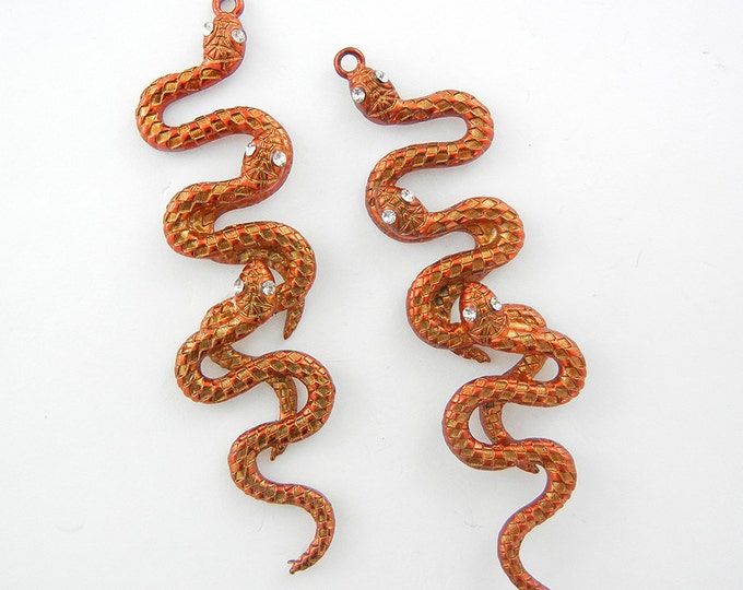 Pair of Long Pearlized Orange Epoxy Triple Snake Charms Rhinestone Eyes