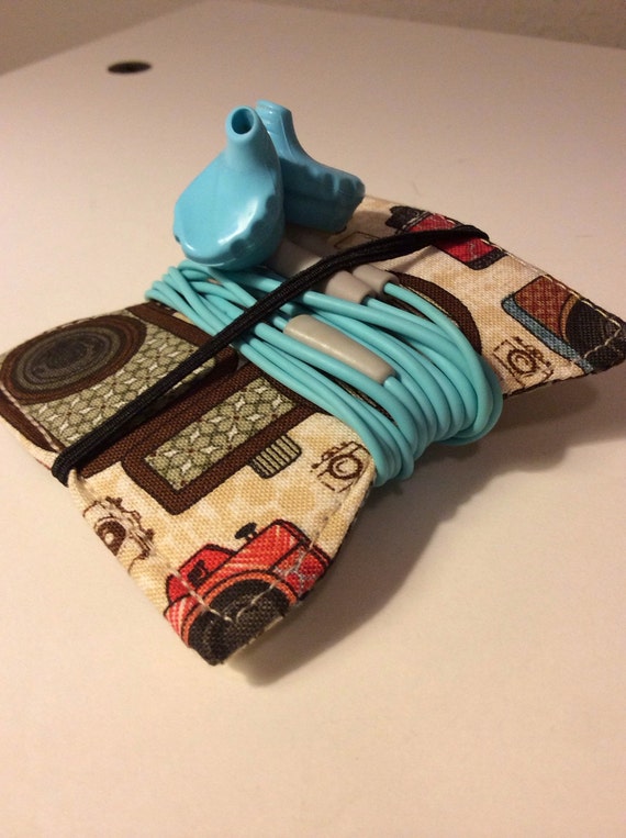 Earbud Keeper Cord Keeper iphone accessory in tiny camera