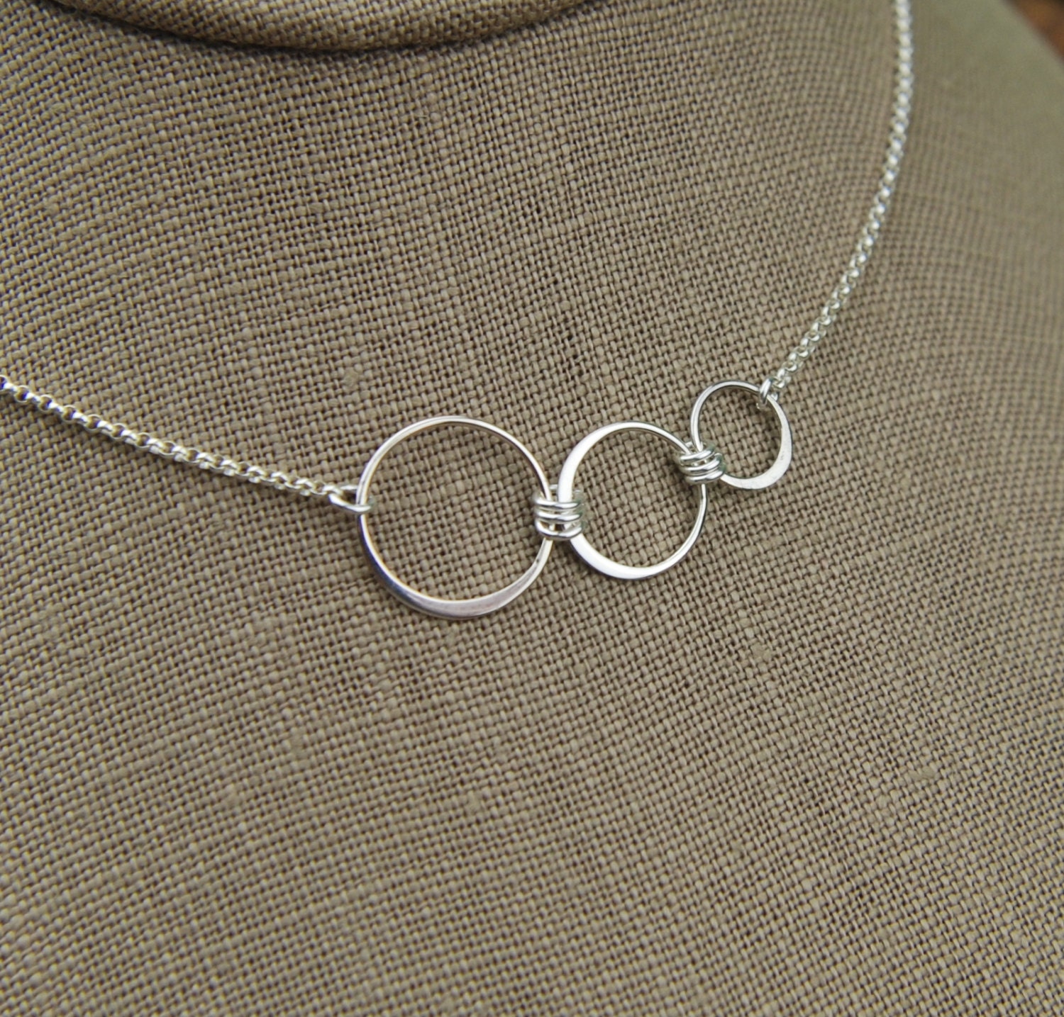 Connected circles infinity necklace in sterling silver three