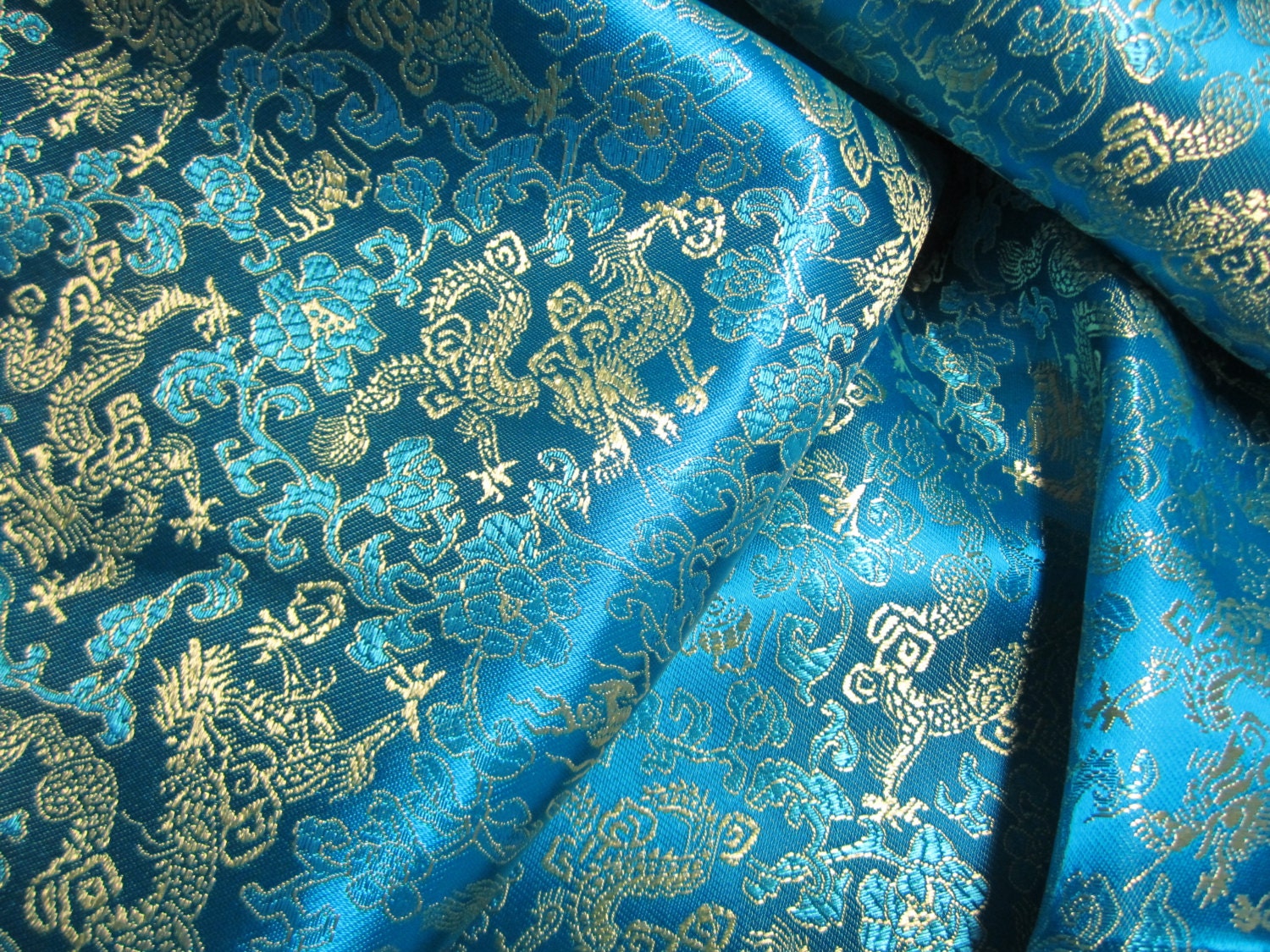 Chinese brocade fabric in turquoise with gold dragons ONE