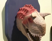 stuffed dinosaur head for wall