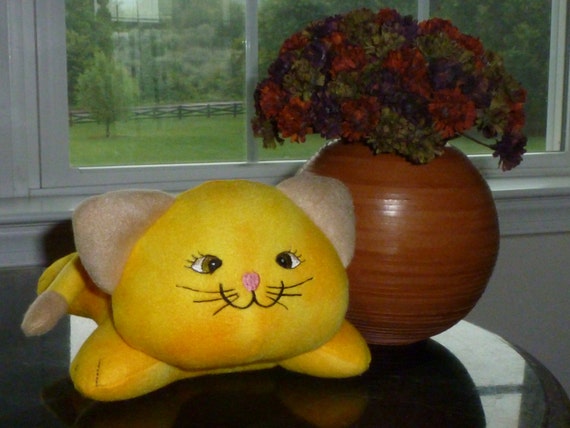 yellow cat stuffed animal