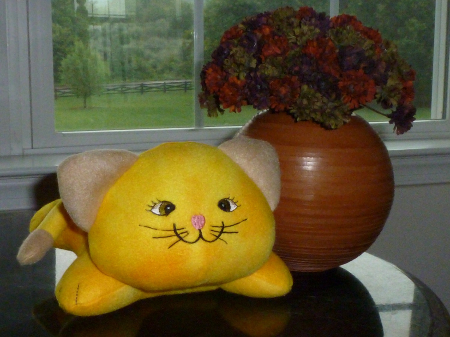 yellow stuffed cat