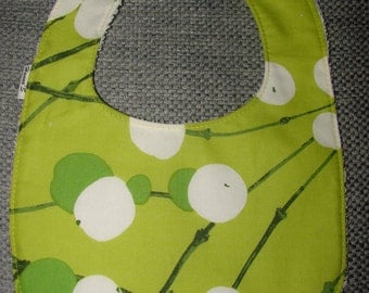 Lime green Lumimarja bib for a girl, Marimekko cotton fabric, Finland,