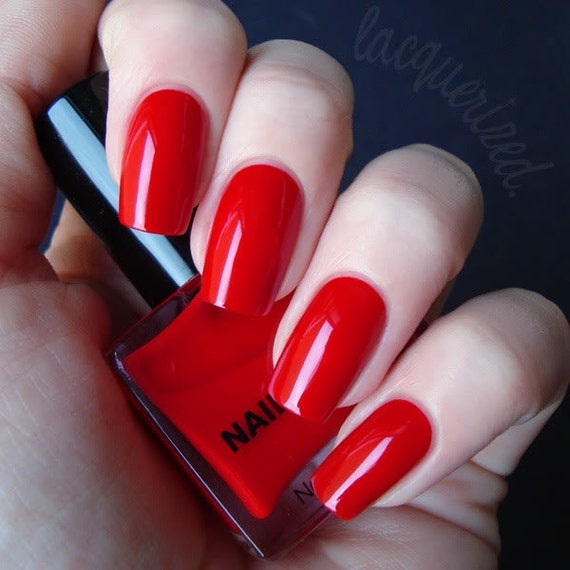 Red nails, stiletto nails, press on nails, square nails, false nails, fake nails, glue on nails, hand painted nails
