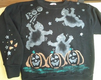 GLOWS IN DARK Child's sz 4 Ghosts and Pumpkins sweatshirt. Hand-painted with Tri-Chem Liquid Embroidery. Machine washable. Hang to dry.