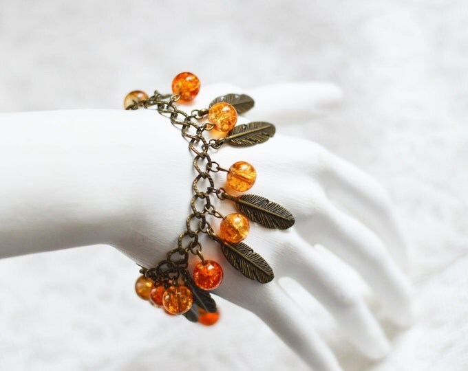 The feather of the Firebird // Bracelet metal brass, beads of glass craquelure // Boho Chic // Fashion // Orange, Brown, Beige, Ombre