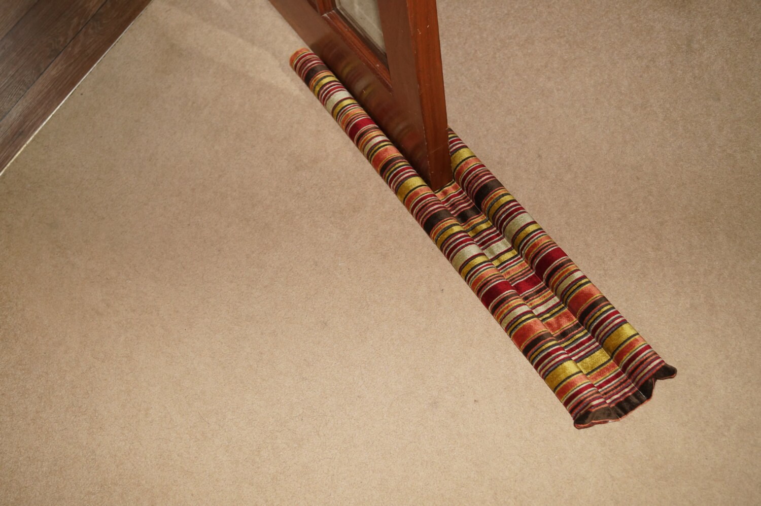 Double sided under door draft excluder. Thick striped