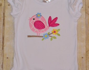 Sweet bird on a branch appliqué ruffle shirt.