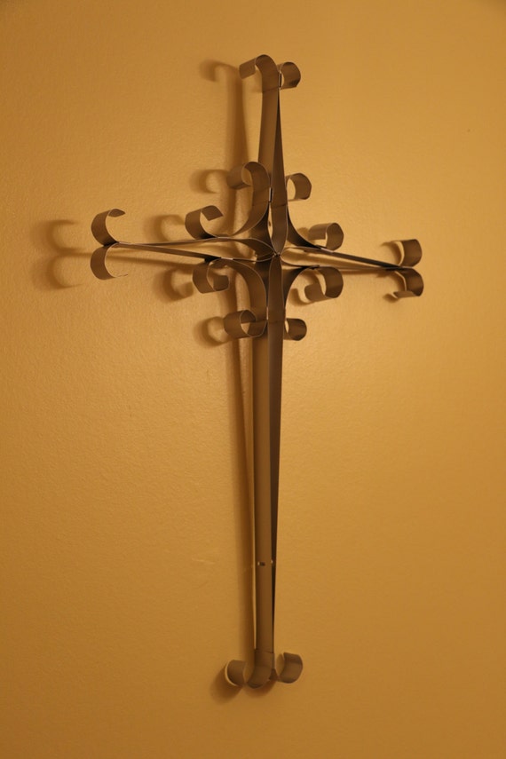 Metal decorative cross wall hanging made from by WindowWhimsy
