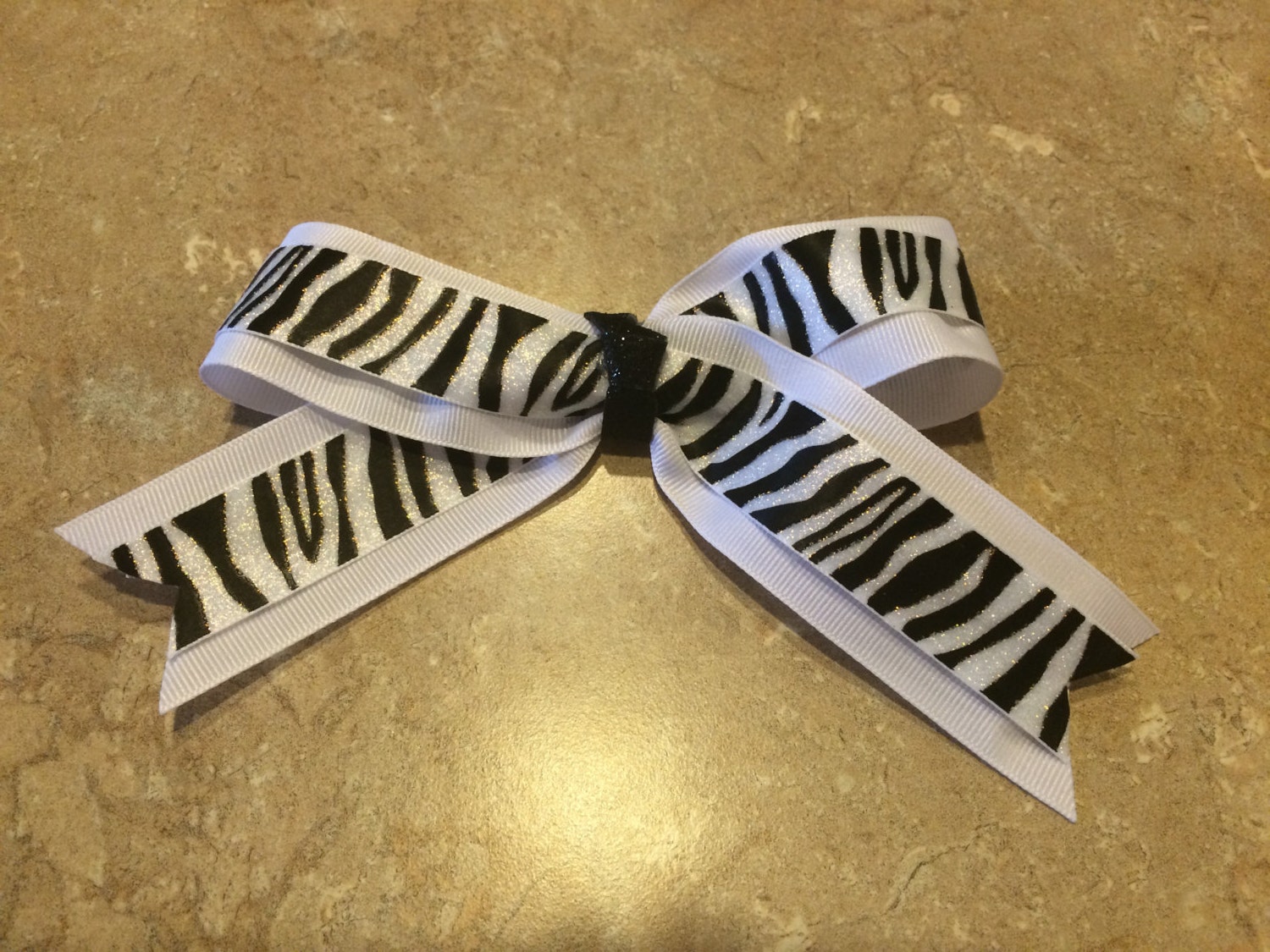Zebra hair bow by DoingsbyDodd on Etsy