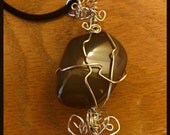 Weird Worry Stone Pendant