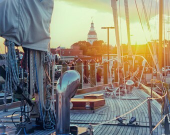 ... photography of the sunset behind the capitol building in annapolis, md