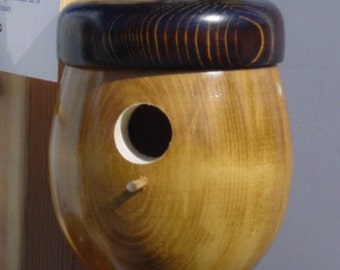 Each Acorn Bird house is hand turned on my Lathe.