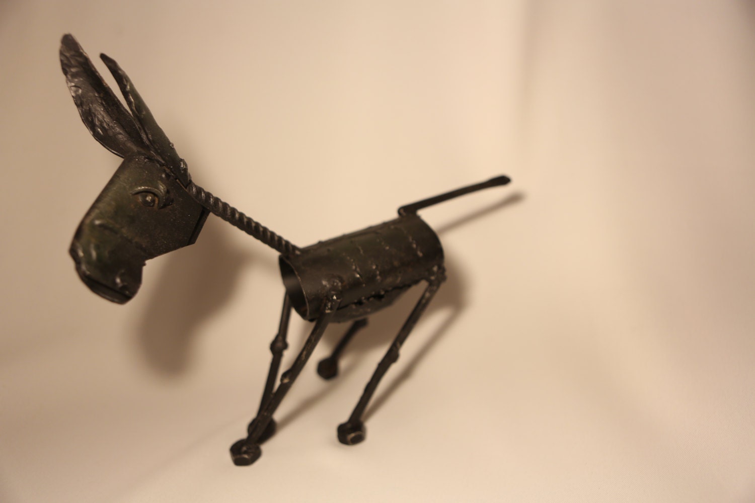 Metal Donkey made out of reclaimed materials.