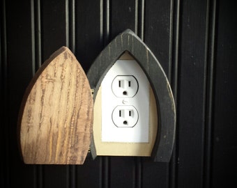 Fairy door that opens, outlet cover casing.