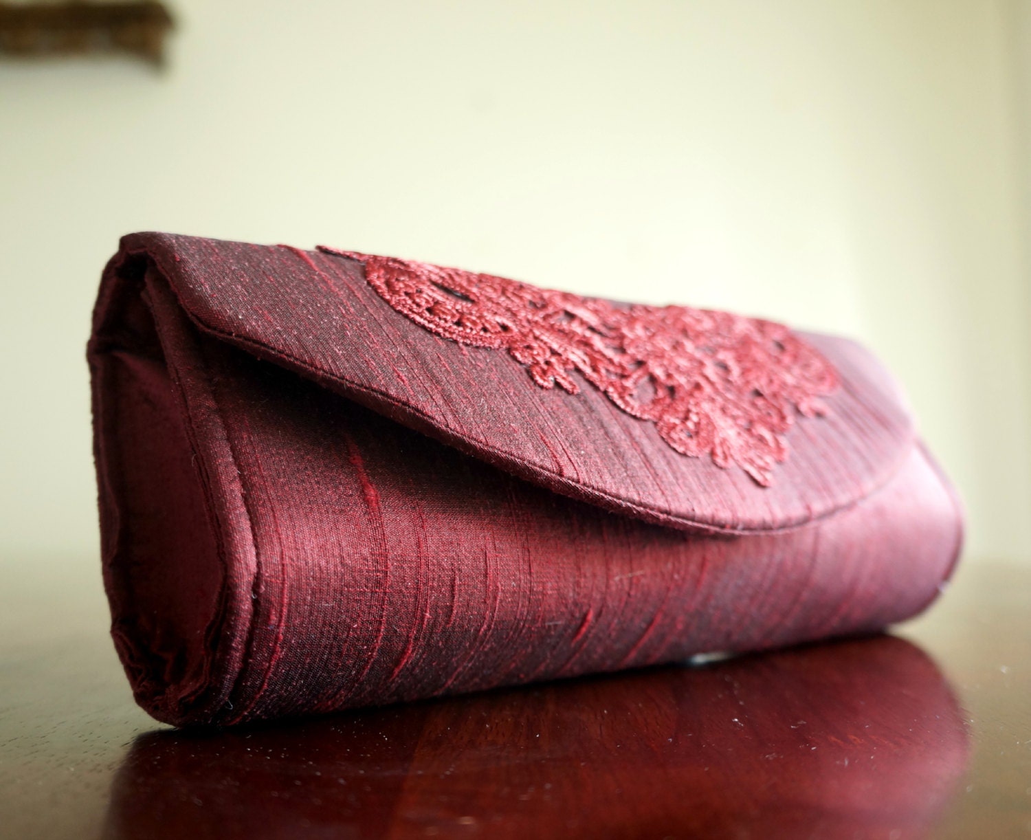 dark burgundy clutch