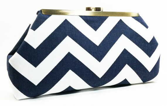 navy blue and white clutch bag