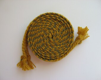 hand-woven wool inkle belt with braided tassels