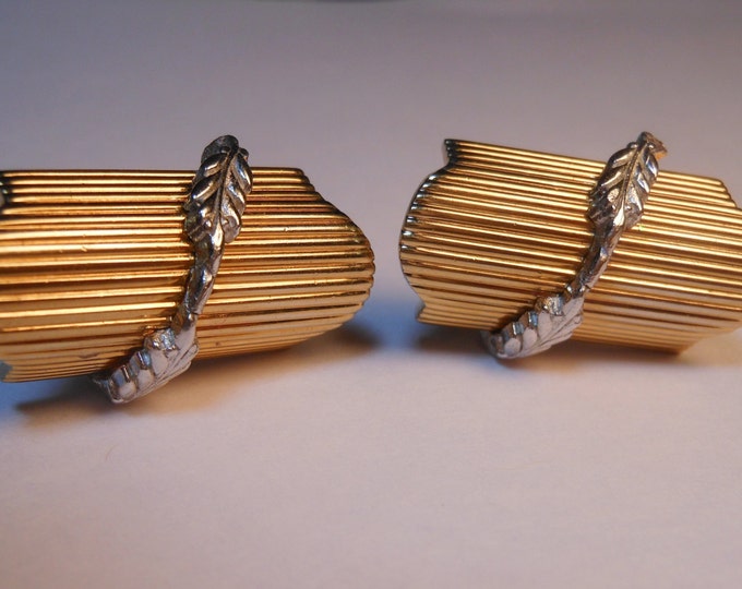 Swank cuff links, Art Deco two toned domed and ribbed with silver leaves overlaying the domed gold