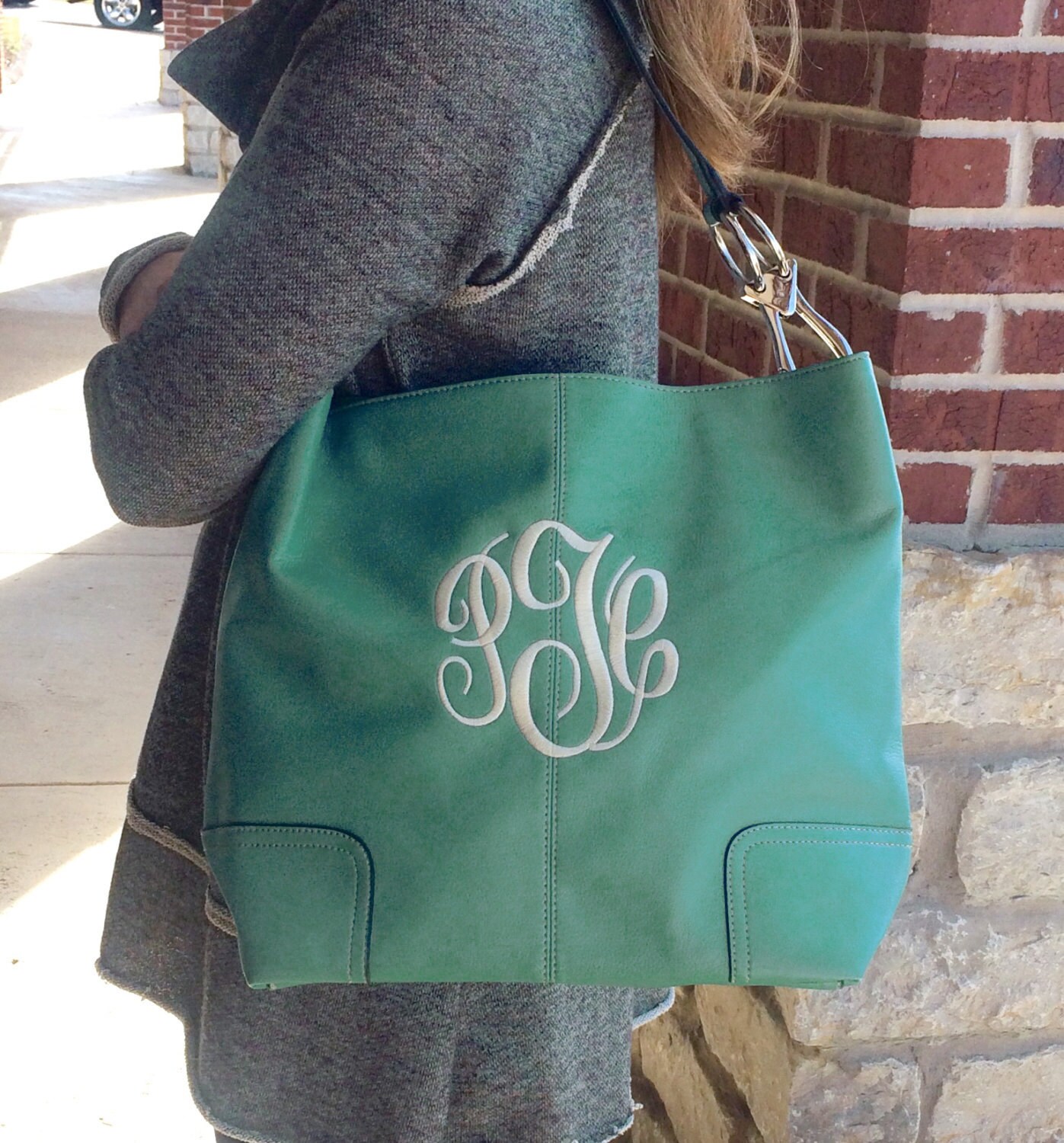 MONOGRAM Turquoise Colored Purse Leather like Font shown