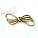 Vintage Gold Triple Bow Brooch Andreas Daub