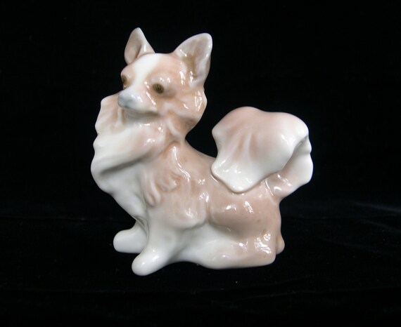 lladro dog with flowers