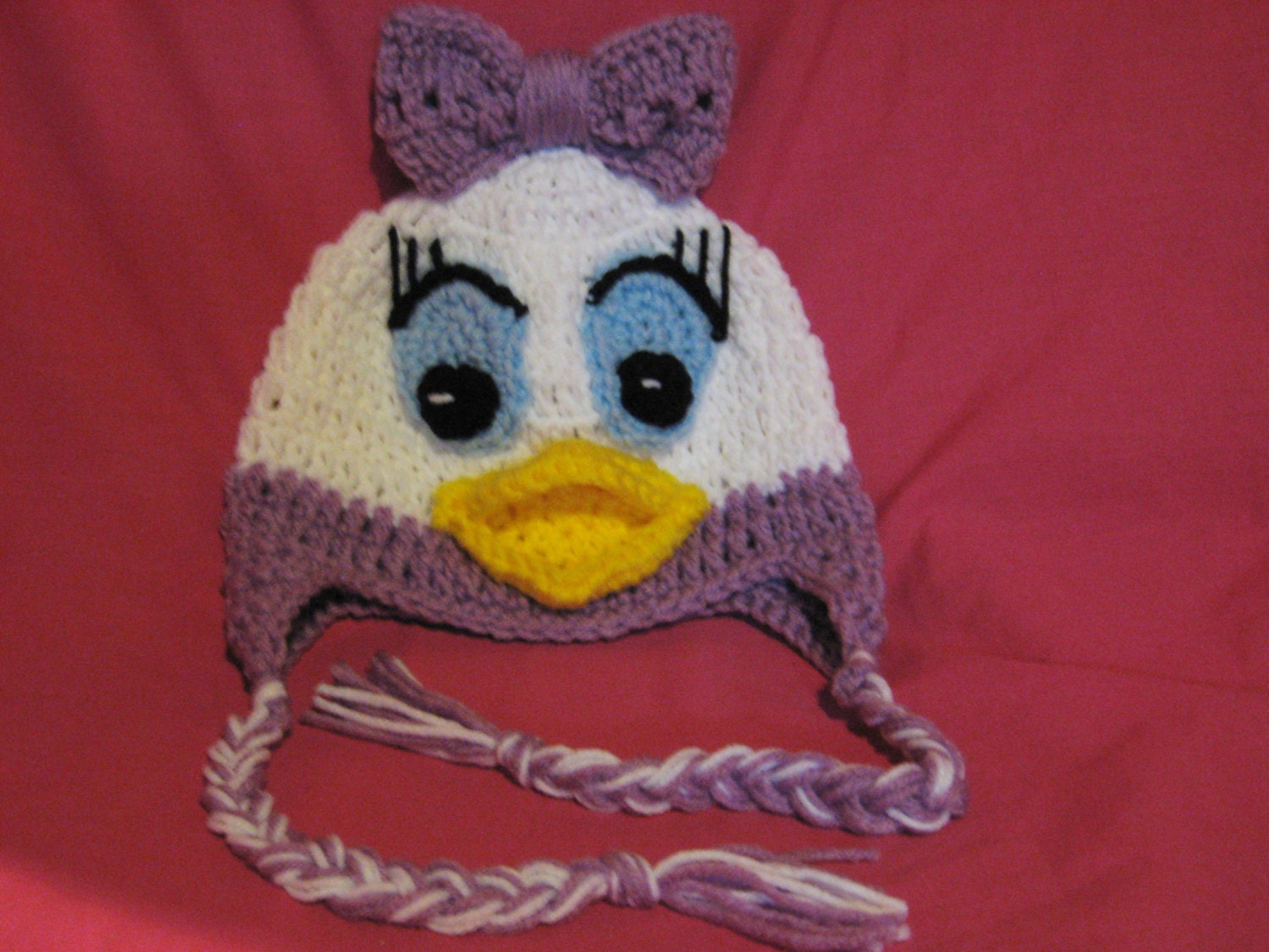 Crocheted Daisy Duck earflap hat daisy by PaulasCrochetArmoire