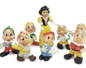 Snow White and 7 Dwarves Rubber Dolls. 1960s Ledra Plastics and Walt Disney Figurines. Rubber Squeak Toys. Snow White and 7 Dwarves Rubber Dolls. 1960s Ledra Plastics and Walt Disney Figurines. Rubber Squeak Toys.