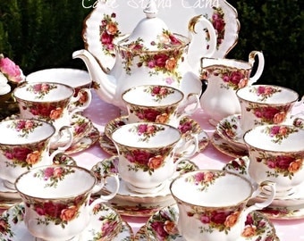 Royal Albert Old Country Roses tea set for 8 people with large teapot,large cake plate, 8 cups, saucers, plates a milk jug and sugar bowl