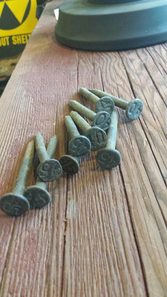 Set of 10 Antique Railroad Nails from the 30s to the 50s.