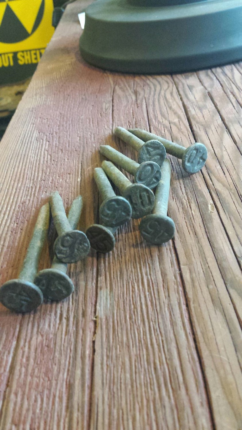 Set of 10 Antique Railroad Nails from the 30s to the 50s.