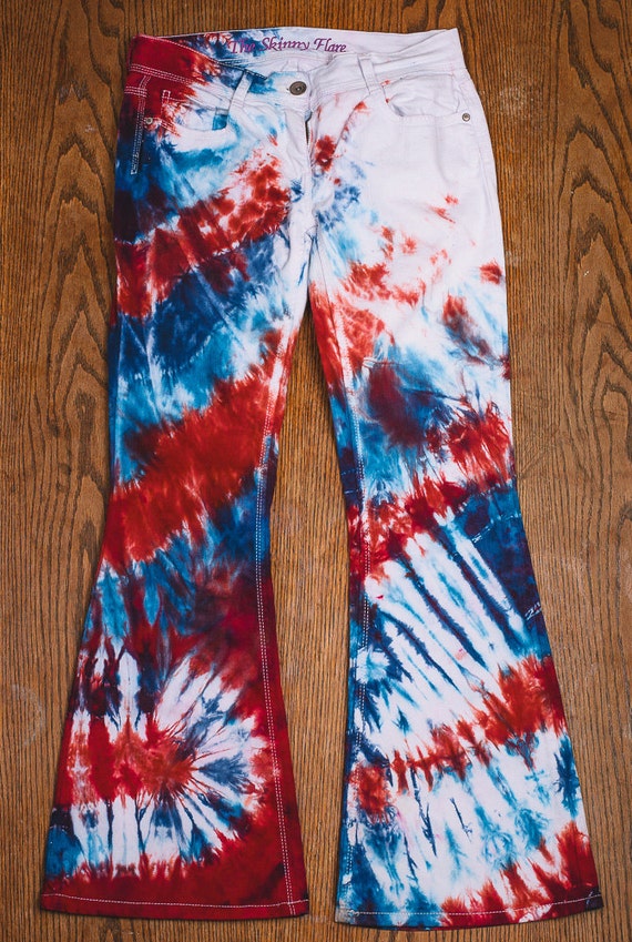 Items similar to Up cycled tie dye Bell Bottom Jeans dyed blue berry