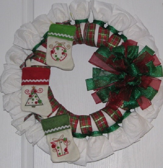 THREE CHRISTMAS STOCKINGS Baby Diaper Wreath
