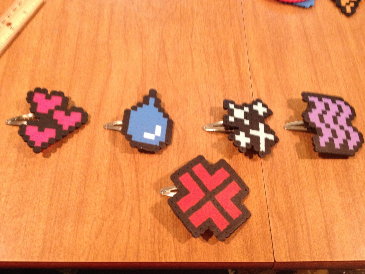 Anime expression perler bead hair clips by PixelCraftsRI on Etsy
