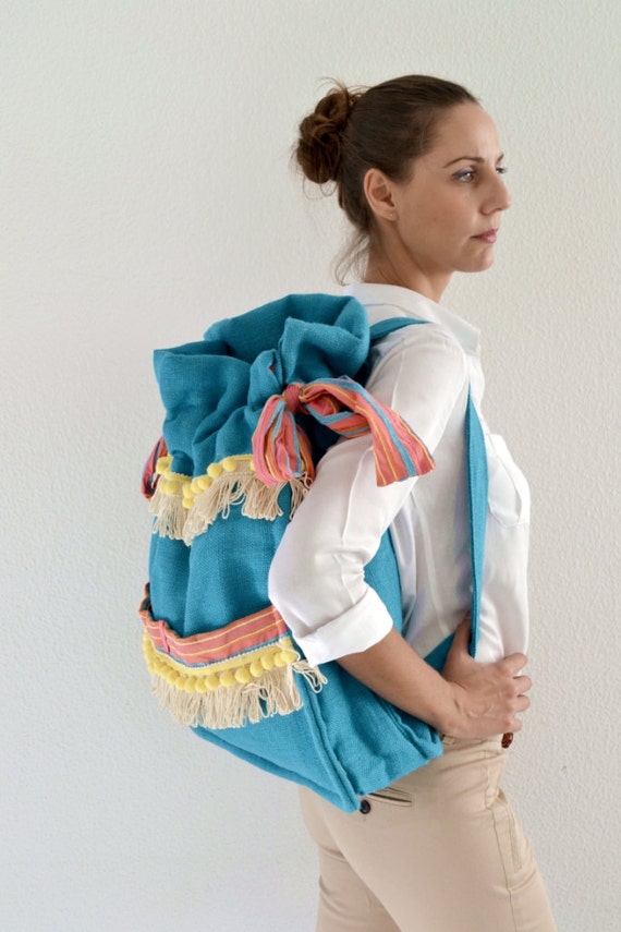 Light blue burlap backpack embellished with trims / by Madaloo