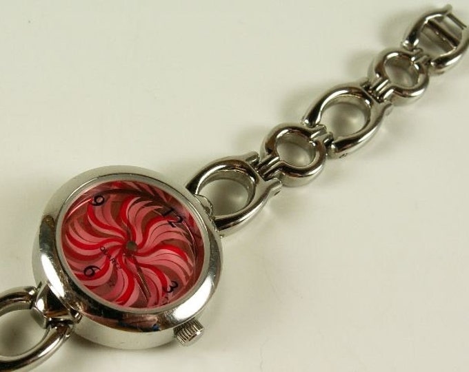 Storewide 25% Off SALE Lovely Vintage Ladies Red Pinwheel Face Quartz Watch Featuring Beautiful Circular Swirl Design And Lovely Silver Tone