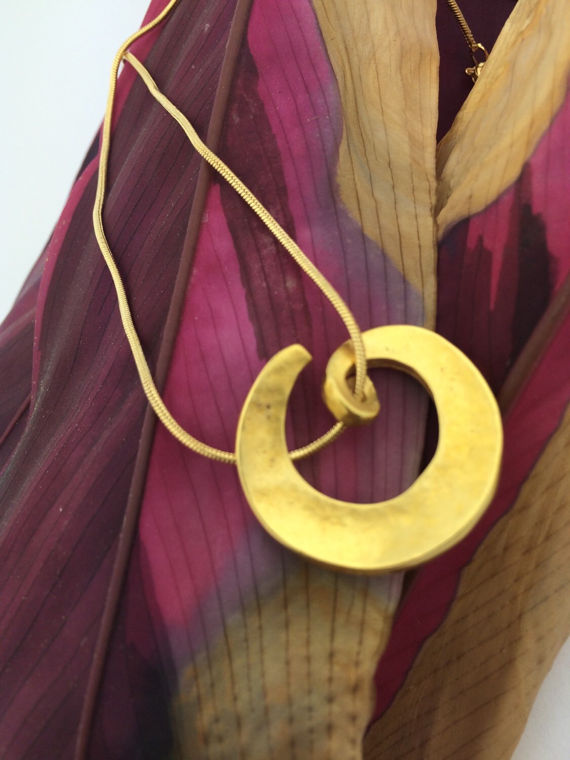 Gold-plated swirl pendant necklace by StefansJewelry on Etsy