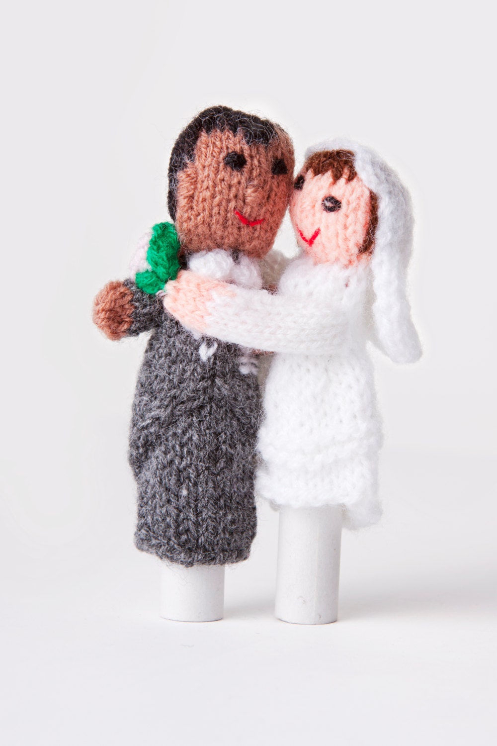 Finger puppets wedding favour to match bride and groom. This