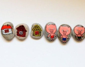 Story Stones "Three Little Pigs" for developing language and thinking skills. Great for parent-child quality time. Sea stones from E-stonia